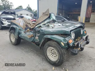 2000 Jeep Wrangler Sahara with VIN 1J4FA59SXYP785570, listed as a Copart auction lot 57659664 with 0 mi miles and Salvage Title. Bid and sale history available at carsss.com. Image 4.