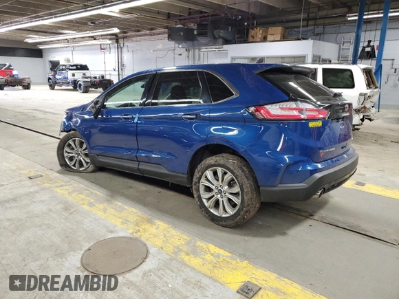 2021 Ford Edge Titanium with VIN 2FMPK4K98MBA18841, listed as a Copart auction lot 56207745 with 69,249 mi miles and Salvage title. Bid and sale history available at DreamBid. Image 2.