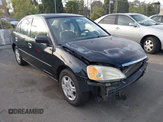 2001 Honda Civic LX with VIN 2HGES16501H619916, listed as a IAAI auction lot 41599951 with 230,395 mi miles. Bid and sale history available at carsss.com. Image 1.