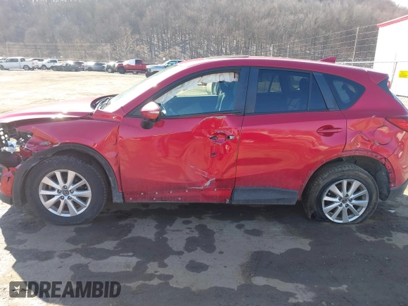 2016 Mazda CX-5 Touring with VIN JM3KE4CY4G0860035, listed as a IAAI auction lot 41678299 with 72,101 mi miles. Bid and sale history available at carsss.com. Image 14.