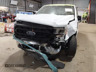 2021 Ford F-150 XL with VIN 1FTMF1CB6MKF13315, listed as a IAAI auction lot 42297728 with 74,450 mi miles and . Bid and sale history available at DreamBid. Image 6.