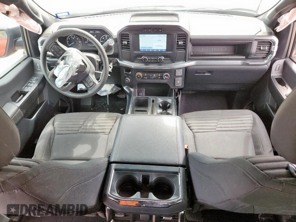 2023 Ford F-150 XL with VIN 1FTEW1CP9PKE72490, listed as a Copart auction lot 60045635 with 10,318 mi miles and Salvage title. Bid and sale history available at DreamBid. Image 8.