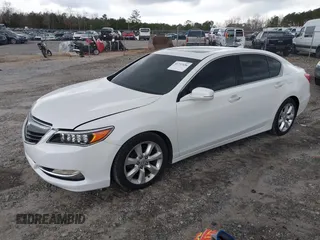 2014 Acura RLX with VIN JH4KC1F39EC004897, listed as a IAAI auction lot 41737436 with 101,104 mi miles. Bid and sale history available at carsss.com. Image 2.