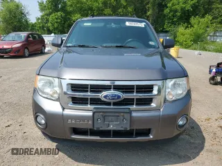 2012 Ford Escape XLT z VIN 1FMCU9DG8CKB35535, wystawiony jako Copart lot #60202675 z przebiegiem 205 750 mil mil oraz Szkoda całkowita • Salvage title. Historia ofert i sprzedaży dostępna na DreamBid. Obrazek 5.