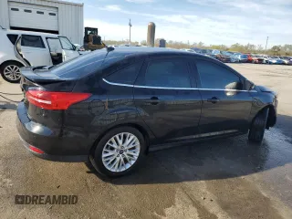 2016 Ford Focus Titanium with VIN 1FADP3J22GL201721, listed as a Copart auction lot 50633795 with 29,801 mi miles and Salvage title. Bid and sale history available at DreamBid. Image 3.