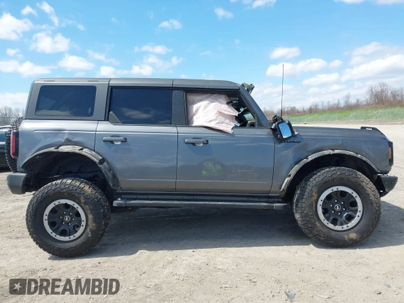 2022 Ford Bronco with VIN 1FMEE5DP3NLB03118, listed as a IAAI auction lot 42096181 with 62,685 mi miles and . Bid and sale history available at DreamBid. Image 13.