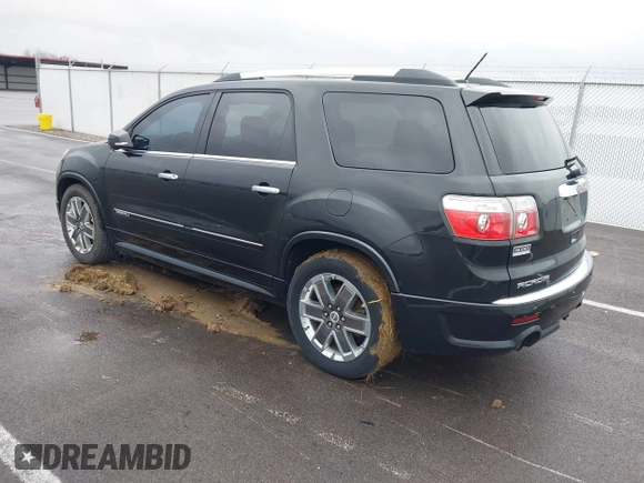 2012 GMC Acadia Denali with VIN 1GKKVTED1CJ330479, listed as a IAAI auction lot 40865663 with 215,430 mi miles. Bid and sale history available at carsss.com. Image 3.