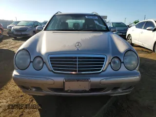 2000 Mercedes-Benz E-Class with VIN WDBJH65J6YB012332, listed as a Copart auction lot 80918284 with 186,616 mi miles and Clean Title. Bid and sale history available at carsss.com. Image 5.