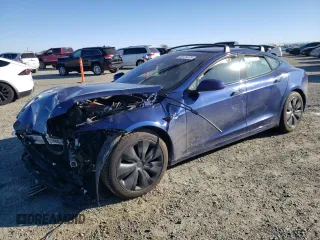 2022 Tesla Model S z VIN 5YJSA1E55NF475989, wystawiony jako Copart lot #88104975 z przebiegiem Nie podano mil oraz Szkoda całkowita • Salvage title. Historia ofert i sprzedaży dostępna na DreamBid. Obrazek 1.