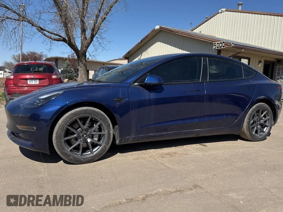 2023 Tesla Model 3 Long Range with VIN 5YJ3E1EB1PF625677, listed as a Copart auction lot 52424245 with 12,817 mi miles and Salvage Title. Bid and sale history available at DreamBid. Image 2.