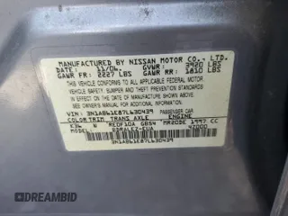 2007 Nissan Sentra S with VIN 3N1AB61E87L630439, listed as a Copart auction lot 52330545 with 70,257 mi miles and Salvage title. Bid and sale history available at DreamBid. Image 14.