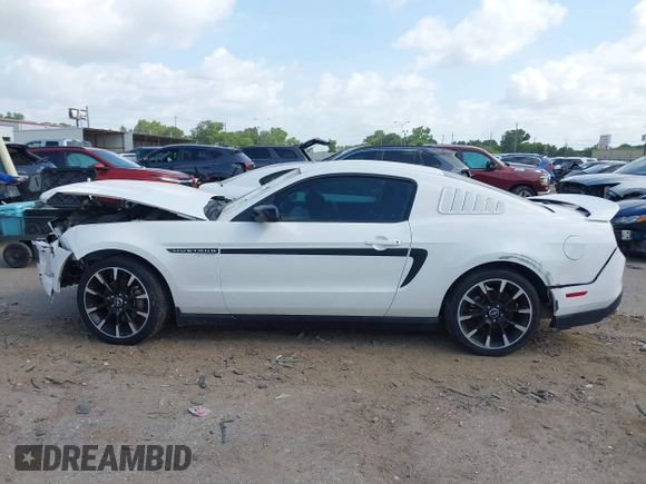 2012 Ford Mustang Premium with VIN 1ZVBP8AM2C5263373, listed as a IAAI auction lot 42447187 with 131,159 mi miles and . Bid and sale history available at DreamBid. Image 14.