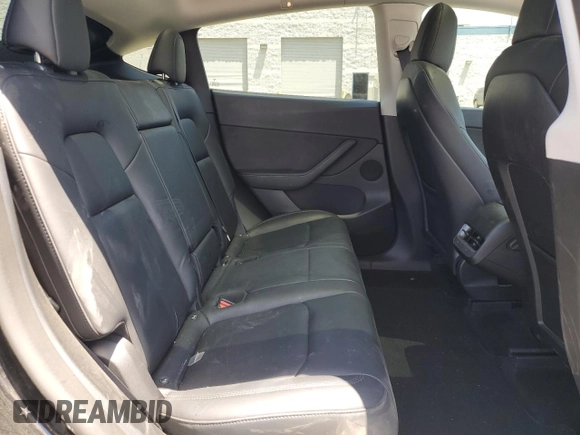 2022 Tesla Model Y Performance z VIN 7SAYGDEF2NF443037, wystawiony jako Copart lot #56870145 z przebiegiem 51 897 mil mil oraz Szkoda całkowita • Salvage title. Historia ofert i sprzedaży dostępna na DreamBid. Obrazek 11.