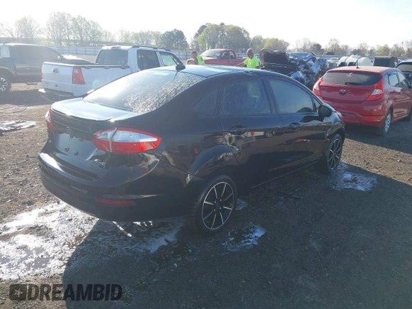 2019 Ford Fiesta SE with VIN 3FADP4BJ3KM117443, listed as a IAAI auction lot 41872511 with 73,981 mi miles. Bid and sale history available at carsss.com. Image 4.
