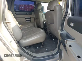 2003 Hummer H2 with VIN 5GRGN23U23H148326, listed as a IAAI auction lot 42068326 with 149,396 mi miles. Bid and sale history available at carsss.com. Image 8.