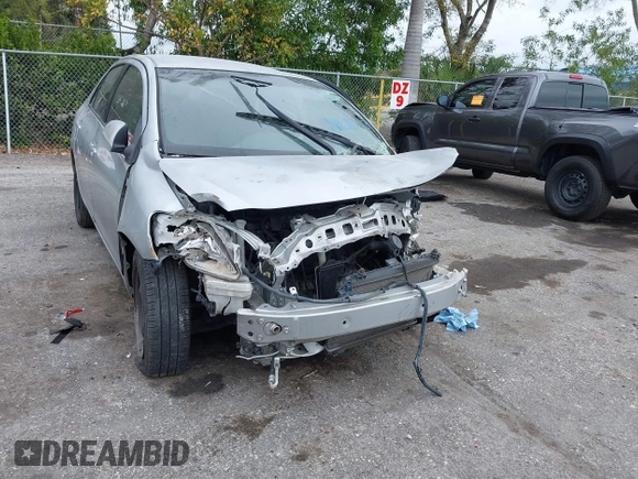 2008 Toyota Yaris with VIN JTDBT923881283264, listed as a IAAI auction lot 41622435 with 174,689 mi miles. Bid and sale history available at carsss.com. Image 6.