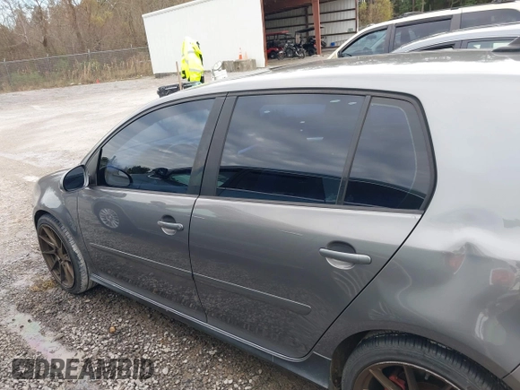 2009 Volkswagen GTI z VIN WVWHV71K79W109174, wystawiony jako IAAI lot #41327836 z przebiegiem 192 645 mil mil oraz . Historia ofert i sprzedaży dostępna na DreamBid. Obrazek 14.