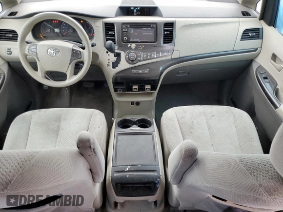 2014 Toyota Sienna LE with VIN 5TDJK3DC5ES093932, listed as a Copart auction lot 63611985 with 142,044 mi miles and Salvage title. Bid and sale history available at DreamBid. Image 8.