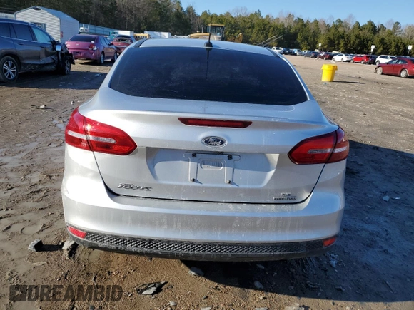 2016 Ford Focus SE z VIN 1FADP3F2XGL399943, wystawiony jako Copart lot #46472415 z przebiegiem 70 047 mil mil oraz Szkoda całkowita • Salvage title. Historia ofert i sprzedaży dostępna na DreamBid. Obrazek 6.