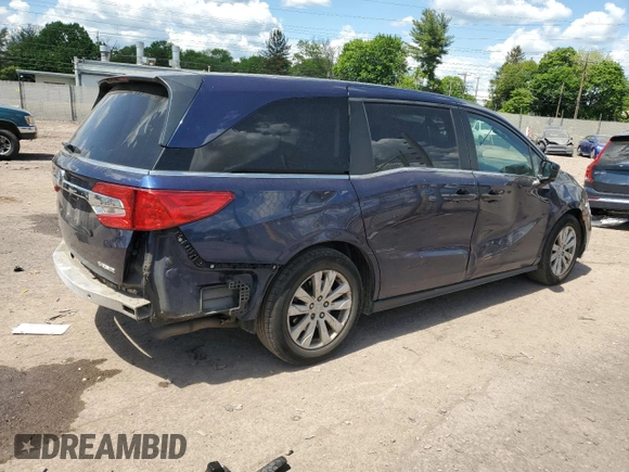 2019 Honda Odyssey LX with VIN 5FNRL6H28KB027071, listed as a Copart auction lot 54882995 with 87,988 mi miles and Salvage Title. Bid and sale history available at DreamBid. Image 3.