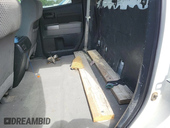 2011 Toyota Tundra with VIN 5TFUY5F1XBX198815, listed as a IAAI auction lot 42571444 with 281,114 mi miles and . Bid and sale history available at DreamBid. Image 18.