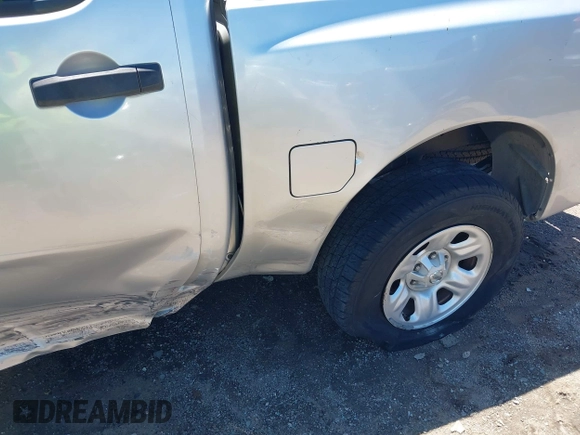 2007 Nissan Titan XE with VIN 1N6AA07AX7N231823, listed as a IAAI auction lot 42300587 with 210,735 mi miles and . Bid and sale history available at DreamBid. Image 18.