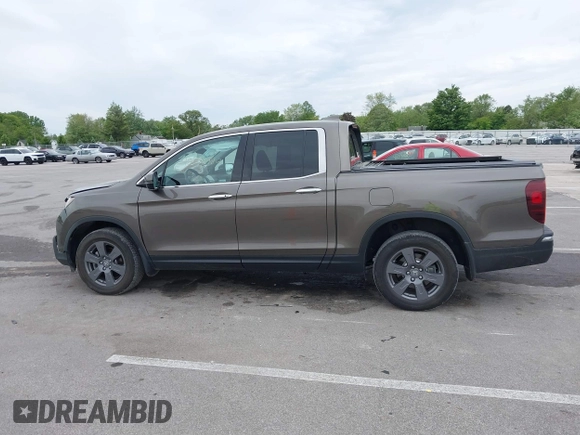 2020 Honda Ridgeline RTL-E with VIN 5FPYK3F78LB001882, listed as a IAAI auction lot 42352980 with 63,278 mi miles and . Bid and sale history available at DreamBid. Image 15.