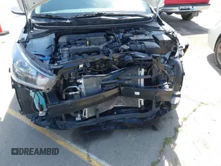 2023 Kia Rio S with VIN 3KPA25AD0PE629868, listed as a IAAI auction lot 41738952 with 25,642 mi miles and . Bid and sale history available at DreamBid. Image 18.