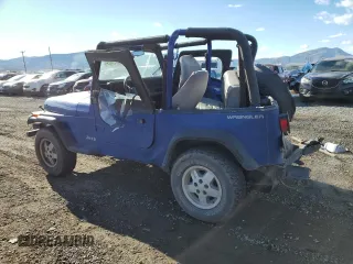 1995 Jeep Wrangler S with VIN 1J4FY19P8SP242032, listed as a Copart auction lot 79724804 with 142,588 mi miles and Clean Title. Bid and sale history available at carsss.com. Image 2.