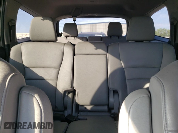 2019 Honda Pilot Touring 8-Passenger z VIN 5FNYF6H90KB000303, wystawiony jako Copart lot #52410585 z przebiegiem 129 190 mil mil oraz Szkoda całkowita • Salvage title. Historia ofert i sprzedaży dostępna na DreamBid. Obrazek 10.