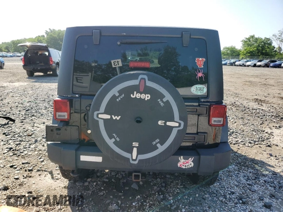 2013 Jeep Wrangler Unlimited Sport with VIN 1C4BJWDG8DL631518, listed as a Copart auction lot 62107765 with 132,617 mi miles and Clean title. Bid and sale history available at DreamBid. Image 6.