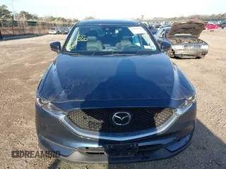 2020 Mazda CX-5 Grand Touring with VIN JM3KFBDM4L0779284, listed as a IAAI auction lot 42060936 with 9,227 mi miles. Bid and sale history available at carsss.com. Image 12.