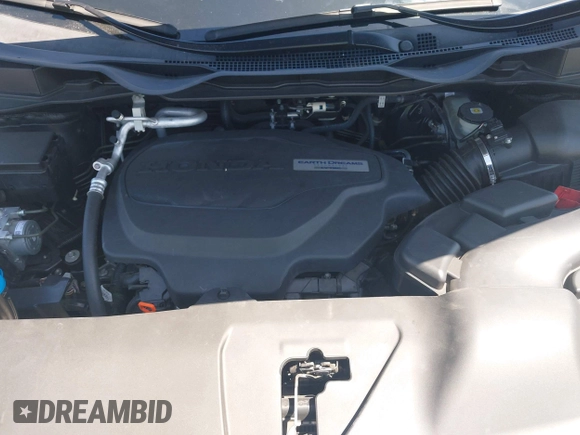 2018 Honda Odyssey Touring with VIN 5FNRL6H8XJB026247, listed as a IAAI auction lot 42298961 with 66,571 mi miles and . Bid and sale history available at DreamBid. Image 10.