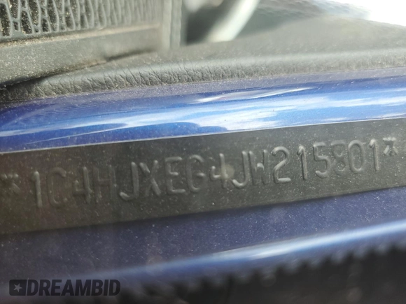 2018 Jeep Wrangler Unlimited Sahara with VIN 1C4HJXEG4JW215801, listed as a Copart auction lot 61774965 with 94,864 mi miles and Salvage title. Bid and sale history available at DreamBid. Image 13.