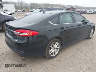 2018 Ford Fusion SE with VIN 3FA6P0HD7JR275157, listed as a IAAI auction lot 41961008 with 120,111 mi miles. Bid and sale history available at carsss.com. Image 4.