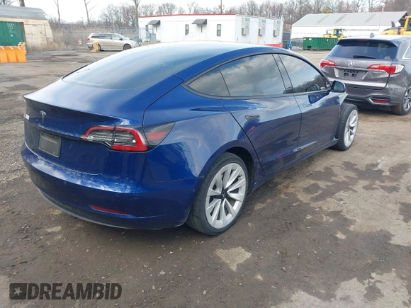 2022 Tesla Model 3 with VIN 5YJ3E1EA7NF188417, listed as a IAAI auction lot 41885623 with 105,457 mi miles and . Bid and sale history available at DreamBid. Image 4.