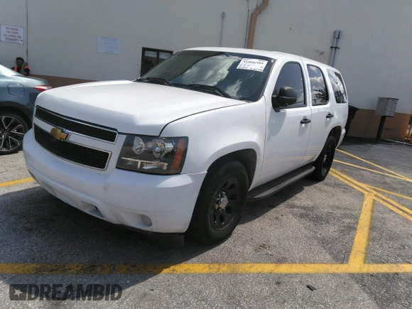 2011 Chevrolet Tahoe Commercial with VIN 1GNLC2E02BR325621, listed as a IAAI auction lot 41866389 with 167,693 mi miles and . Bid and sale history available at DreamBid. Image 2.