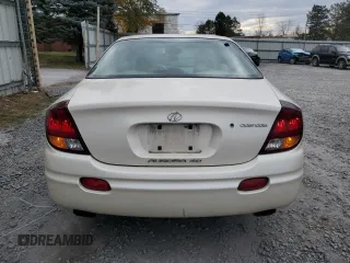 2001 Oldsmobile Aurora z VIN 1G3GS64CX14180971, wystawiony jako Copart lot #79035554 z przebiegiem 62 228 mil mil oraz Szkody całkowita. Historia ofert i sprzedaży dostępna na DreamBid. Obrazek 6.
