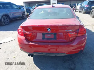 2015 BMW 4 Series 428i with VIN WBA3N3C57FK233391, listed as a IAAI auction lot 41260038 with 86,487 mi miles and . Bid and sale history available at DreamBid. Image 17.