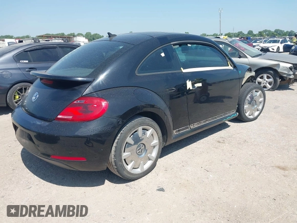 2013 Volkswagen Beetle 2.5L with VIN 3VWHX7AT3DM603962, listed as a IAAI auction lot 42329256 with 137,285 mi miles and . Bid and sale history available at DreamBid. Image 4.