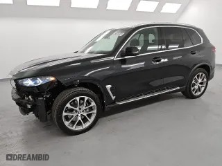 2024 BMW X5 sDrive40i with VIN 5UX13EU04R9V40249, listed as a Copart auction lot 85168844 with 21,012 mi miles and Clean Title. Bid and sale history available at carsss.com. Image 1.
