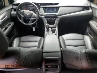 2021 Cadillac XT5 FWD Luxury with VIN 1GYKNAR46MZ127028, listed as a Copart auction lot 47555235 with 48,364 mi miles and Salvage Title. Bid and sale history available at carsss.com. Image 8.