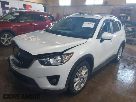 2013 Mazda CX-5 Grand Touring with VIN JM3KE4DE1D0159632, listed as a IAAI auction lot 41524272 with 99,479 mi miles. Bid and sale history available at carsss.com. Image 17.