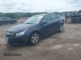2014 Chevrolet Cruze 1LT with VIN 1G1PC5SB9E7466910, listed as a IAAI auction lot 42658455 with 167,614 mi miles and . Bid and sale history available at DreamBid. Image 2.