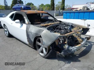 2013 Dodge Challenger SXT z VIN 2C3CDYAGXDH524225, wystawiony jako IAAI lot #41913504 z przebiegiem Nie podano mil oraz . Historia ofert i sprzedaży dostępna na DreamBid. Obrazek 1.