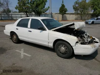2007 Ford Crown Victoria LX with VIN 2FAFP74V47X119952, listed as a Copart auction lot 71025704 with 220,034 mi miles and Salvage Title. Bid and sale history available at carsss.com. Image 4.