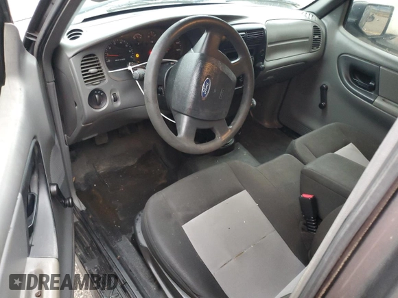2009 Ford Ranger XL z VIN 1FTYR14D79PA23100, wystawiony jako Copart lot #51119585 z przebiegiem 120 334 mil mil oraz Szkoda całkowita • Salvage title. Historia ofert i sprzedaży dostępna na DreamBid. Obrazek 8.