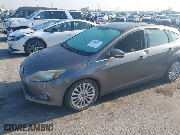 2012 Ford Focus Titanium with VIN 1FAHP3N22CL200249, listed as a IAAI auction lot 42149873 with 103,805 mi miles and . Bid and sale history available at carsss.com. Image 2.