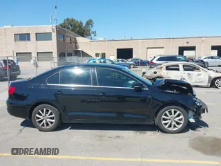 2013 Volkswagen Jetta SE with VIN 3VWDP7AJ8DM350702, listed as a IAAI auction lot 42652788 with 106,655 mi miles and . Bid and sale history available at DreamBid. Image 14.