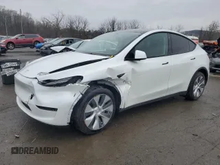 2023 Tesla Model Y Long Range with VIN 7SAYGDEEXPA122953, listed as a Copart auction lot 52627095 with Not Provided miles and Salvage Title. Bid and sale history available at DreamBid. Image 1.